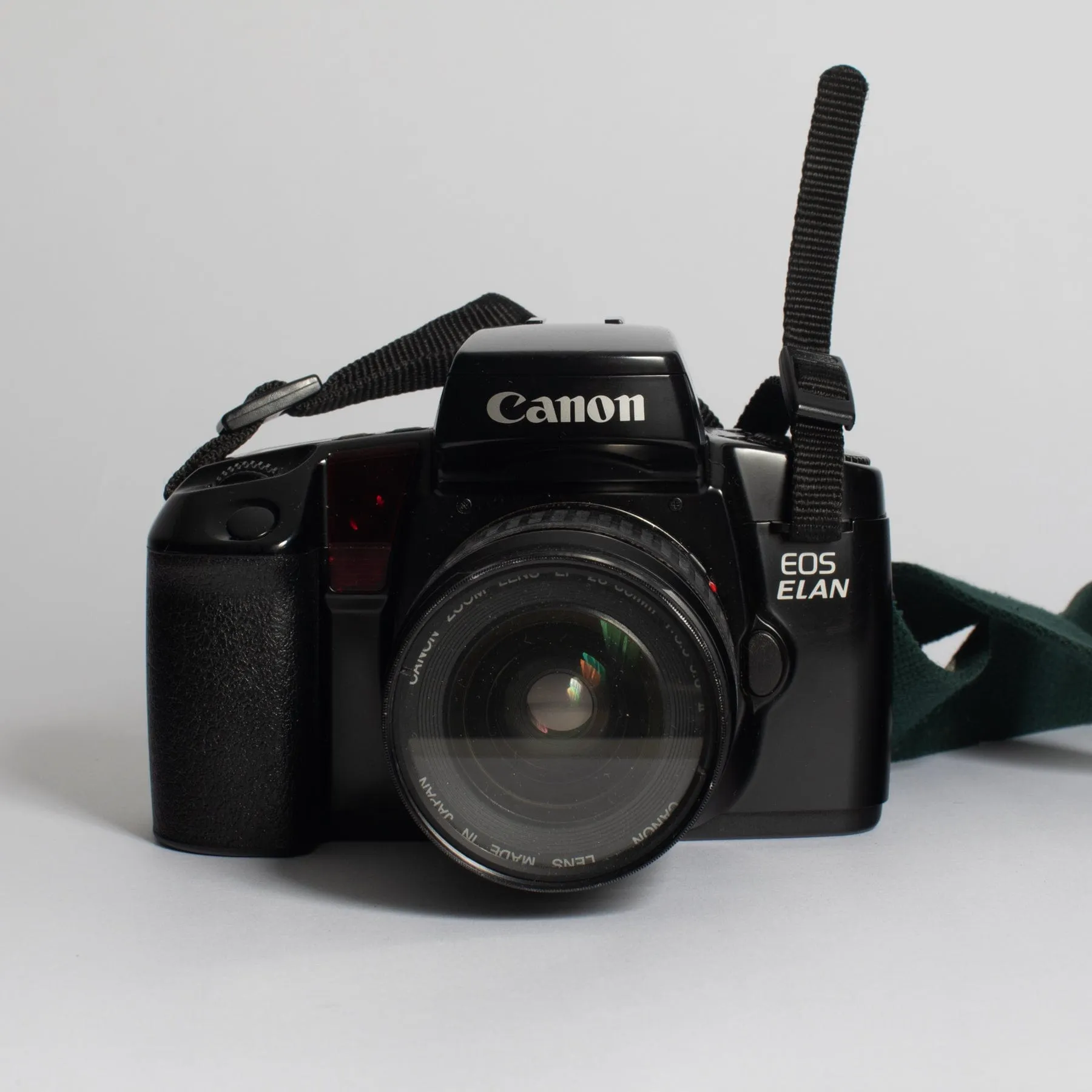 Canon EOS ELAN with 28-80 f/3.5-5.6 II, 75-300 f/4-5.6 III, Bag and Strap