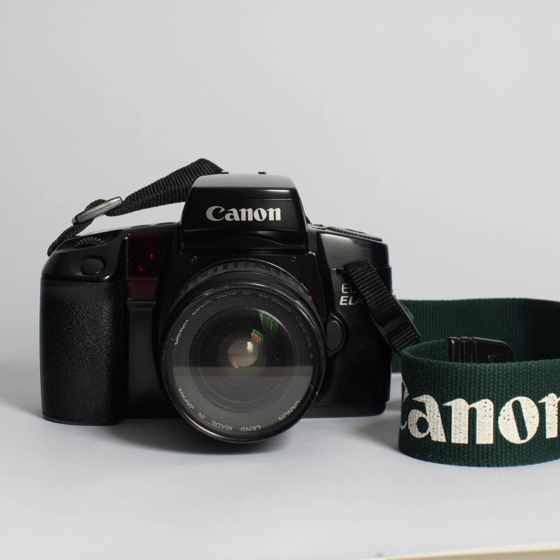 Canon EOS ELAN with 28-80 f/3.5-5.6 II, 75-300 f/4-5.6 III, Bag and Strap