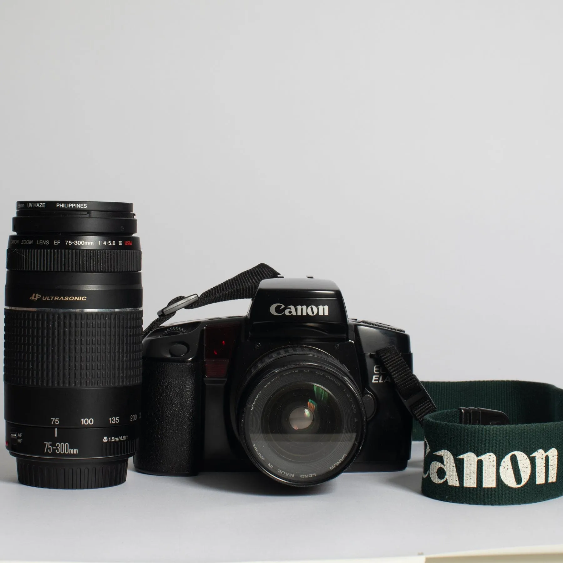 Canon EOS ELAN with 28-80 f/3.5-5.6 II, 75-300 f/4-5.6 III, Bag and Strap