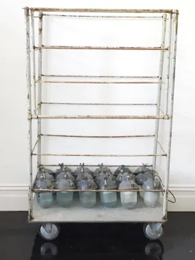 Vintage industrial mobile metal hospital display trolley storage